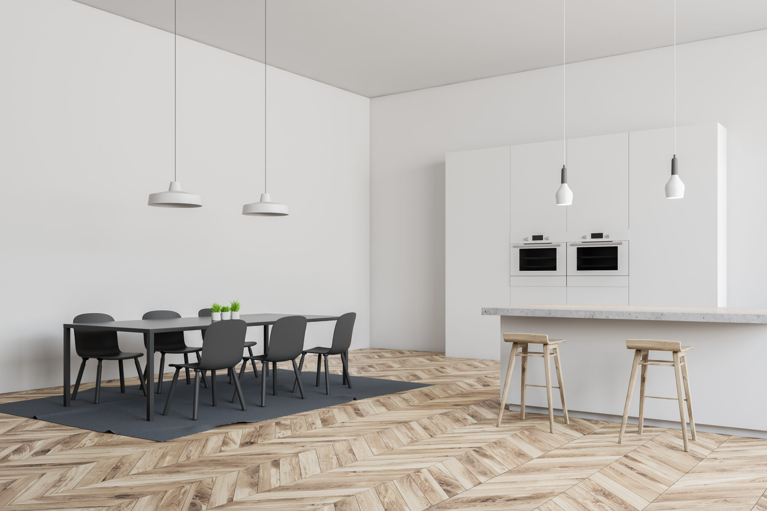 Corner of modern kitchen with white walls, wooden floor, white bar with stools, cupboard with ovens and gray table with chairs. 3d rendering